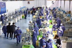 بازتاب افتتاح کارخانه بزرگ تولید ماسک ایران در شبکه چین + فیلم