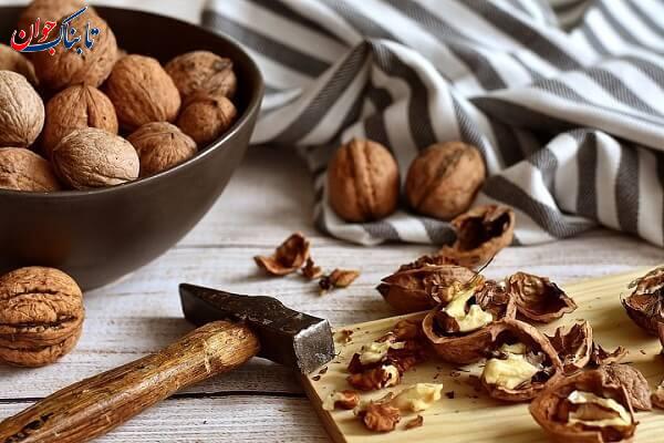 شکستن گردو مصرف زیاد گردو باعث چه بیماری میشود؟ + عوارض